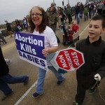 Participants in the Louisiana Life March CENLA travel down the Jackson Street Bridge. Doug Collier photo
