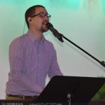 Kevin Williams, worship leader at the Gathering Place in Wardville, leads a time of music.