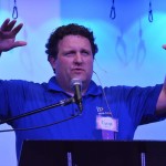 Trent DeLoach shares about showing Christ’s love to refugees in Clarkston, Ga. During his message, DeLoach took the participants through a refugee loss simulation of how they would feel if they lost everything and had to suddenly flee their homeland for a foreign land. DeLoach is pastor of Clarkston International Bible Church.