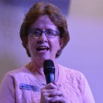 Janie Wise, women’s missions and ministry strategist for Louisiana Baptists, greets women attending the WMU Mission Celebration.