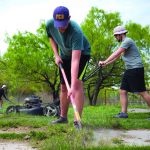 LSU BCM student Dennis Rivera (front) spruces up the area around the basketball court of a camp where the
team stayed during a mission trip to Mexico March 23-30. Nearly 200 members of the LSU, New Orleans Metro
and Southern University BCM also shared the Gospel at Bible clubs, led sports clinics and distributed food.