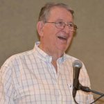Don Mabry, former Louisiana Baptist Convention missions and ministry director, welcomes former Louisiana Baptist directors of missions to their reunion at the Baptist Building.