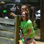 A Champions Camp participant and her buddy take aim at the competition in bazooka ball.