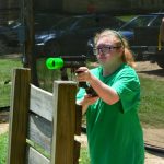 A Champions Camp participant takes aim at the competition in bazooka ball.