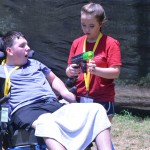 A Champions Camp participant receives instructions for how to play bazooka ball.