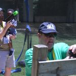 A Champions Camp participant takes aim at the competition in bazooka ball.