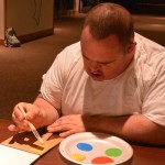 A Champions Camp participant show off his skills during craft time.