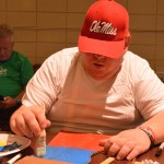 A Champions Camp participants show off his skills during craft time.