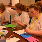 Champions Camp participants show off their skills during craft time.