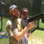 Champions Camp Pastor Jarrod Hawthorne shares a smile with a camper. Hawthorne is pastor of the Crossing Church in Monroe.