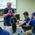 Preston Nix, professor of evangelism and evangelistic preaching at New Orleans Baptist Theological Seminary, taught a group of seminarians gathered at Southwestern Baptist Theological Seminary June 9 before they went door-to-door evangelizing in the Dallas metroplex as part of Crossover. The group had 3,180 gospel conversations throughout the afternoon. Kathleen Murray photo