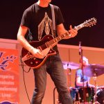 A guitarist with the Matt Papa Band leads worship during the Louisiana College chapel service.