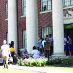 Students file into a dormitory at Louisiana College.