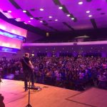 Students, faculty and staff of Louisiana College gather inside Guinn Auditorium to participate in worship with the Matt Papa Band.