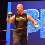 Steve Carrier of MegaForce Ministries pumps himself up before bending a pole. Carrier also broke a bat and tore phone books with his bare hands.