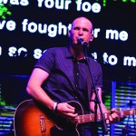 Noah Cleveland leads a time of worship at the Tomorrow's Hope Crusade.