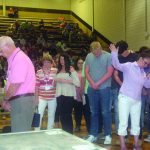 Tomorrow's Hope Crusade attendees come forward to indicate a decision during a time of invitation.