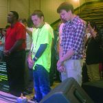 Tomorrow's Hope Crusade attendees come forward to indicate a decision during a time of invitation.