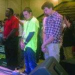 Tomorrow's Hope Crusade attendees come forward to indicate a decision during a time of invitation.