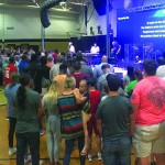 Tomorrow's Hope Crusade attendees pray during a time of invitation.