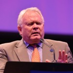 Louisiana College President Rick Brewer prays for students during the campus fall revival.