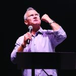 Rick Gage makes a passionate plea to make a decision for Christ during the opening night of the Hope4U GO TELL Crusade. “If a person wants to go heaven he’s got to go through Jesus,” said Gage, founder of GO TELL Crusades in Duluth, Georgia. “If you want to go to heaven my friend you’ve got to go the Jesus way.