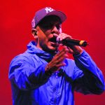 Christian hip hop artist Gawvi performs a mini concert during the Hope4U GO TELL Crusade.