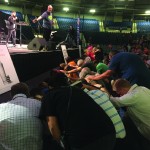 Dozens of people line the altar after a call to pray for restoration and the lost by evangelist Ken Freeman on the second night of the Hope4U GO TELL Crusade.