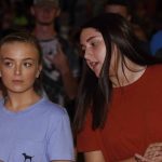 Students inquire about the message brought by evangelist Rick Gage during the final night of the Tomorrow's Hope GO TELL Crusade. Doug Collier photo