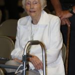 A woman relaxes before the final night of the Tomorrow's Hope GO TELL Crusade begins. Doug Collier photo