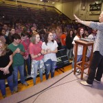 Evangelist Rick Gage shares with students about their need for Christ. Doug Collier photo