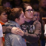 Students listen to evangelist Rick Gage present the plan of salvation. Doug Collier photo