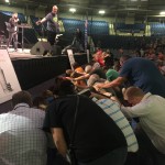Dozens line up at the altar to pray for restoration and lost souls during the second day of the Hope4U Crusade at the Rapides Parish Coliseum in Alexandria. Brian Blackwell photo