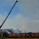 Crews battle a fire that engulfed several buildings at First Bossier December 10, 2018.