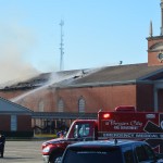 Crews battle a fire that engulfed several buildings at First Bossier December 10, 2018.