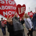 Right to life supporters march across the Long-Allen Bridge between Shreveport and Bossier City during the Louisiana Life North Jan. 26, 2019. Doug Collier photo