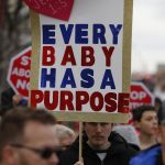 Right to life supporters march across the Long-Allen Bridge between Shreveport and Bossier City during the Louisiana Life March North.