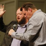 Trey McGuire, Warrior Network, says a prayer asking for the protection of our Military during the Call to Prayer IV at Broadmoor Baptist Church in Shreveport.