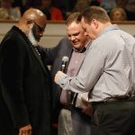 Josh Cagle, Oak Hill and C.V. Johns, Hip Hope Church, pray during the Pastoral Prayer for One another during the Call to Prayer IV at Broadmoor Baptist Church in Shreveport.