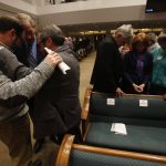 Guests gather together in groups of three to pray during the Call to Prayer IV at Broadmoor Baptist Church in Shreveport.