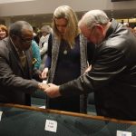 Guests gather together in groups of three to pray during the Call to Prayer IV at Broadmoor Baptist Church in Shreveport.
