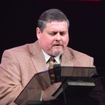 Stan Statham, association mission strategist for Baptist Associations of Southeast Louisiana, opens the second day of ECON in prayer.