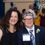 A special guest and his buddy enjoys a Night to Shine at the Lamar Dixon Expo Center in Gonzales.