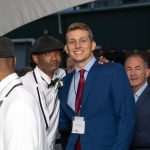 A special guest and his buddy enjoy a Night to Shine at the Lamar Dixon Expo Center in Gonzales.