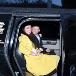 A special guest prepares to exit limo at Night to Shine in Ruston.