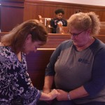 REAL closed with women praying that God would use them to stand for Christ in their communities.