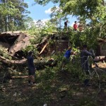 Volunteers worked on a home that received damage to its roof. Rolling Hills photo