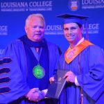 Louisiana College President Rick Brewer presented diplomas to 13 athletes who graduated during a special ceremony May 1, 2019. Brian Blackwell photo