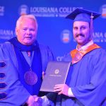 Louisiana College President Rick Brewer presented diplomas to 13 athletes who graduated during a special ceremony May 1, 2019. Brian Blackwell photo