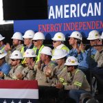 LNG employees applaud as President Donald Trump speaks at the Cameron LNG Export Terminal in Hackberry, LA Tuesday in his effort to promote Energy Infrastructure and Economic Growth.